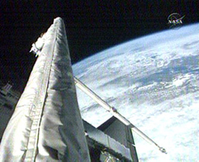 Astronauts Inspect Space Shuttle Heat Shield
